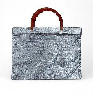 Vintage 1960s metallic silver tote bag with lucite bamboo handles